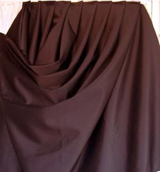 Caida de raso drapeado