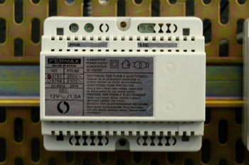 Fuente de alimentación, portero automático, modelo II