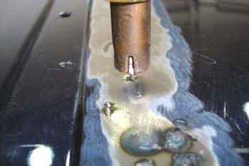 Operación de soldadura de arandelas de tiro