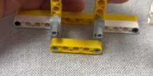 Anímate a construir un coche con las piezas de Nezha, usando engranajes cónicos.