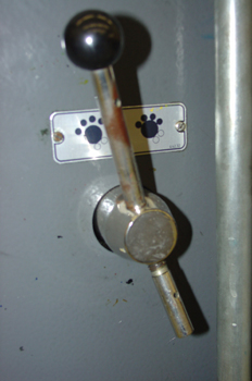 Palanca de control de rodillos dadores