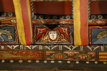 Detalle de pintura en alfarje. Cara humana, Huesca