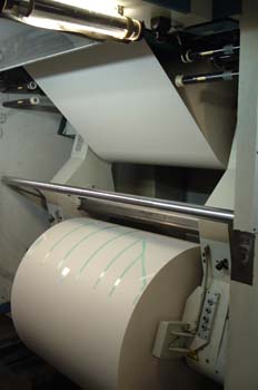 Cargador de bobinas automático