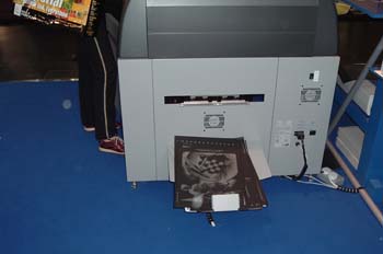 Filmadora de planchas de poliéster