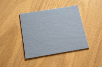 Zona V reflejada a través de un cartón gris