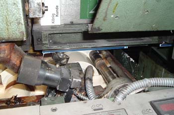 Aplicación de cola en línea de encuadernado