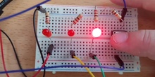 Selector LEDs con pulsador en Arduino