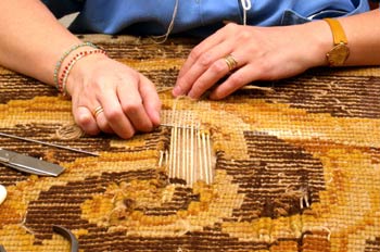 Fabricación artesanal de alfombra