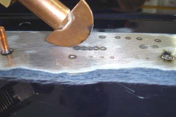 operación de soldadura con roldana