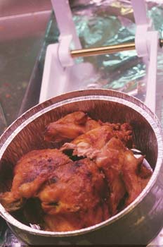 Envasado de un pollo asado