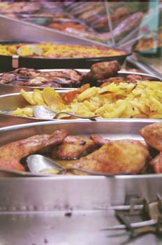 Conejo, patatas y paella