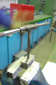 Operación de escareado.