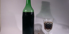 botella y copa de vino