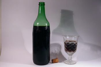 botella y copa de vino