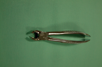 Fórceps molares superior derecho