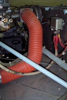 Conducto de aire caliente al carburador