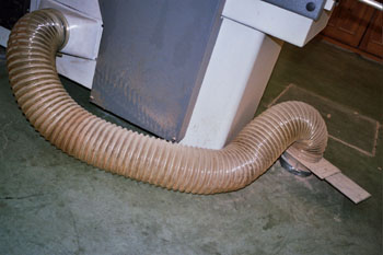 Sistema de aspiración en una cepilladora