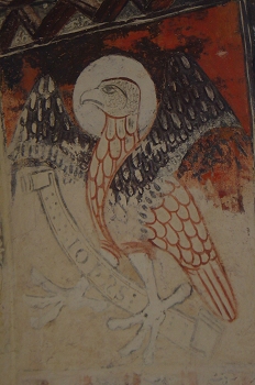 Grabado de cabeza de águila que representa a San Juan, Huesca