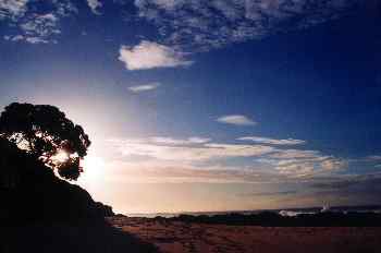 Playa y puesta de sol en Northwind Lodge, Nueva Zelanda
