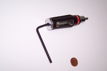 Destornillador autoajustable con escala exterior