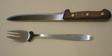 Cuchillo y tenedor para trinchar