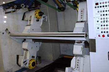 Mecanismo volteador de bobinas