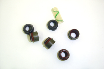 Retenes de válvulas y útil posicionador.