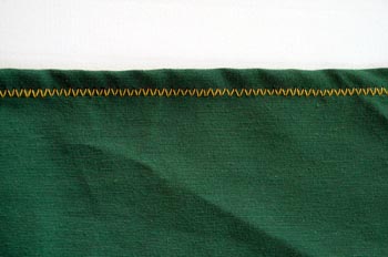 Borde a puntada en zigzag de máquina plana