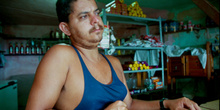 Dependiente de una tienda de alimentación, favela de Rio de Jane