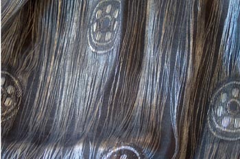 Triple urdimbre jacquard con bastas verticales