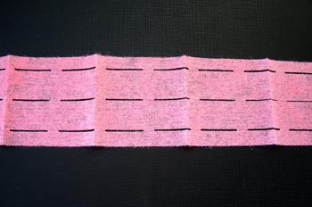 Cinta perforada adhesiva