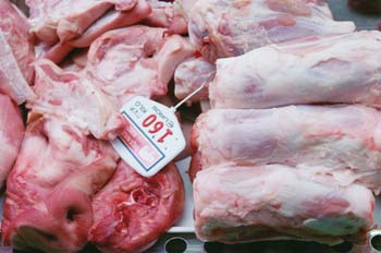 Rabo, manos y morro de cerdo