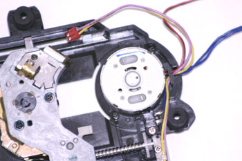 Pick-up óptico (OPU). Motor de giro.