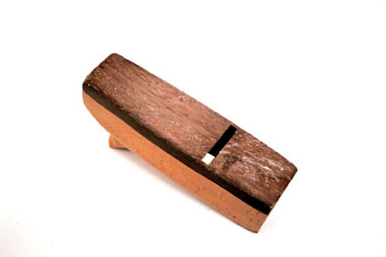 Zapata y base de cepillo