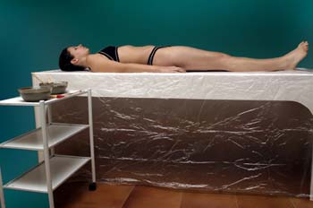 Envolturas de arcillas y algas: colocación cliente y preparado d