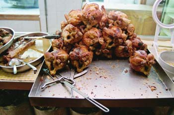 Bandeja de pollos asados