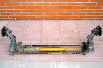 Puente trasero con barras de torsión