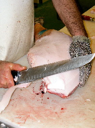 Separación de tocino y piel del cerdo