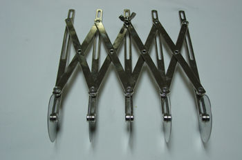 Rueda cortadora extensible