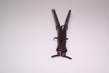 Alicate para la colocación de segmentos en pistón