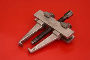 Extractor universal de dos garras