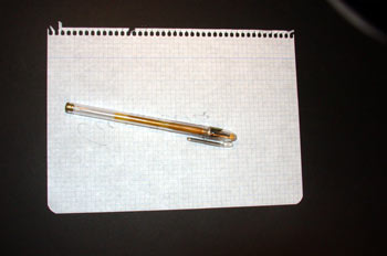 Cuartilla y bolígrafo