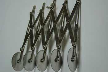 Rueda cortadora extensible